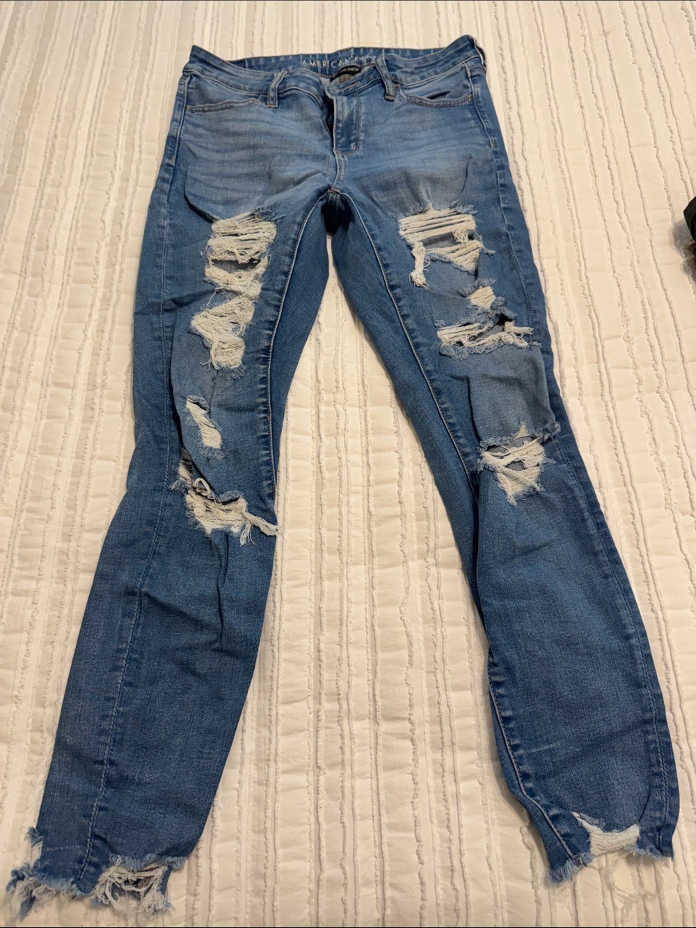 American Eagle Outfitters Distressed Skinny Jeans in Blue